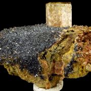 Apatite, hematite, quartz and actinolite pseudo. after pyroxene