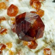 Garnet var. Spessartine and Quartz