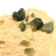 Hydroxylapatite + Microcline + Mica + Quartz.