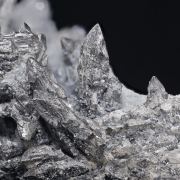 Allargentum after Dyscrasite on Calcite