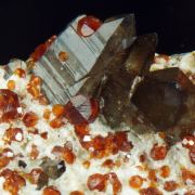 Garnet var. Spessartine and Quartz