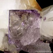 Calcite twin on Fluorite etched corner