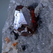 Sphalerite -gemmy red on Quartz
