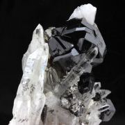 Cassiterite + Quartz + Arsenopyrite.