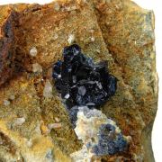 Scorzalite / (rare) / with Quartz