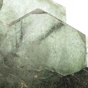 Fluorapatite with Actinolite (var: Byssolite) inclusions