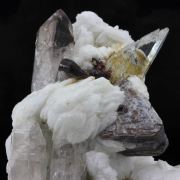 Orthoclase, Quartz, Garnet, Mica.