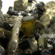 Siderite on Pyrite (replacing Siderite) with Stannite