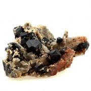 Dravite, Quartz, Fluorapatite.