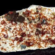 Garnet var. Spessartine and Quartz