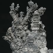 Allargentum after Dyscrasite with Sphalerite, Pyrargyrite and Schachnerite on Calcite