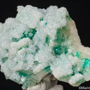 Calcite on Dioptase in Calcite