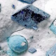 Henmilite coated by Calcite and on Olshanskyite