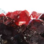 Cuprite (gemmy red crystals) on Chrysocolla / Mashamba West Mine, Kolwezi mining district, Lualaba, DR Congo