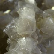 Chalcedony on Smoky Quartz “casts” after Laumontite