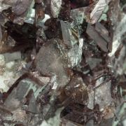 Axinite-(Fe) with Chlorite