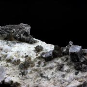 Titanite (Sphene) + Calcite.