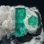 Beryl (variety emerald) on Calcite