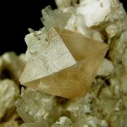 Powellite on Scolecite with Apophyllite