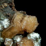 Olmiite with Bultfonteinite