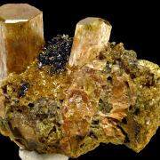 Apatite, hematite, quartz and actinolite pseudo. after pyroxene