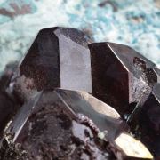 Cuprite (gemmy red crystals) on Chrysocolla / Mashamba West Mine, Kolwezi mining district, Lualaba, DR Congo