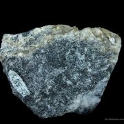 Tinzenite (Tl) in Calcite and Hematite