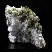 Quartz with Byssolite inclusions + Epidote.