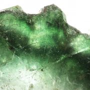 Fluorapatite with Actinolite (var: Byssolite) inclusions