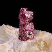 Corundum (var: Ruby) on Calcite