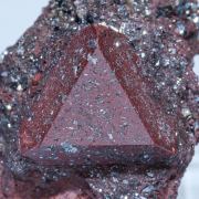 Zunyite with Hematite