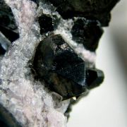 Alabandite on Rhodochrosite