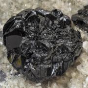 Cassiterite with Muscovite