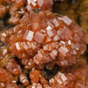 Vanadinite on Siderite