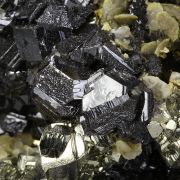 Pyrite “horseshoe” with Siderite on Sphalerite