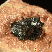 Hausmannite on Andradite