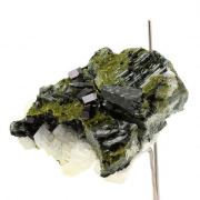 Andradite, Diopside, Epidote, Calcite.