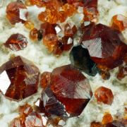 Garnet var. Spessartine and Quartz