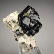 GARNET var. ANDRADITE var. MELANITE, FELDSPAR PSEUDOMORPH