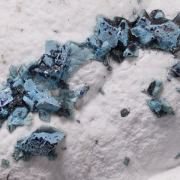 Henmilite coated by Calcite and on Olshanskyite