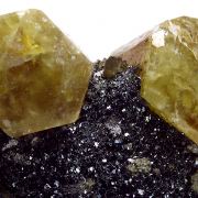 Apatite, hematite, quartz and actinolite pseudo. after pyroxene