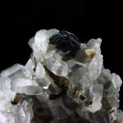 Albite + Epidote + Hematite.