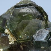 Fluorapatite with Ferberite, Siderite and Muscovite