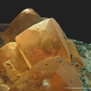 Fluorite (twinned) included by Cinnabar, with Pyrite - illustrated