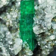 Beryl (variety emerald) on Calcite