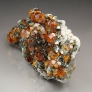 gem GARNET var. SPESSARTINE, MUSCOVITE