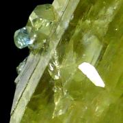 Diopside, grossular var. tsavorite, graphite