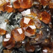 gem GARNET var. SPESSARTINE, MUSCOVITE