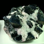 Alabandite on Rhodochrosite