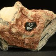 Hausmannite on Andradite